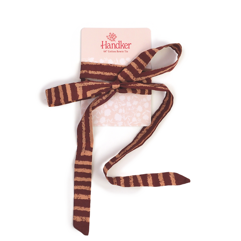 A brown Sammie Pink Bowie Tie with horizontal light-colored stripes, tied in a bow style around a Handker Bandanas product card.