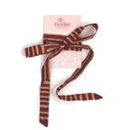 A brown Sammie Pink Bowie Tie with horizontal light-colored stripes, tied in a bow style around a Handker Bandanas product card.