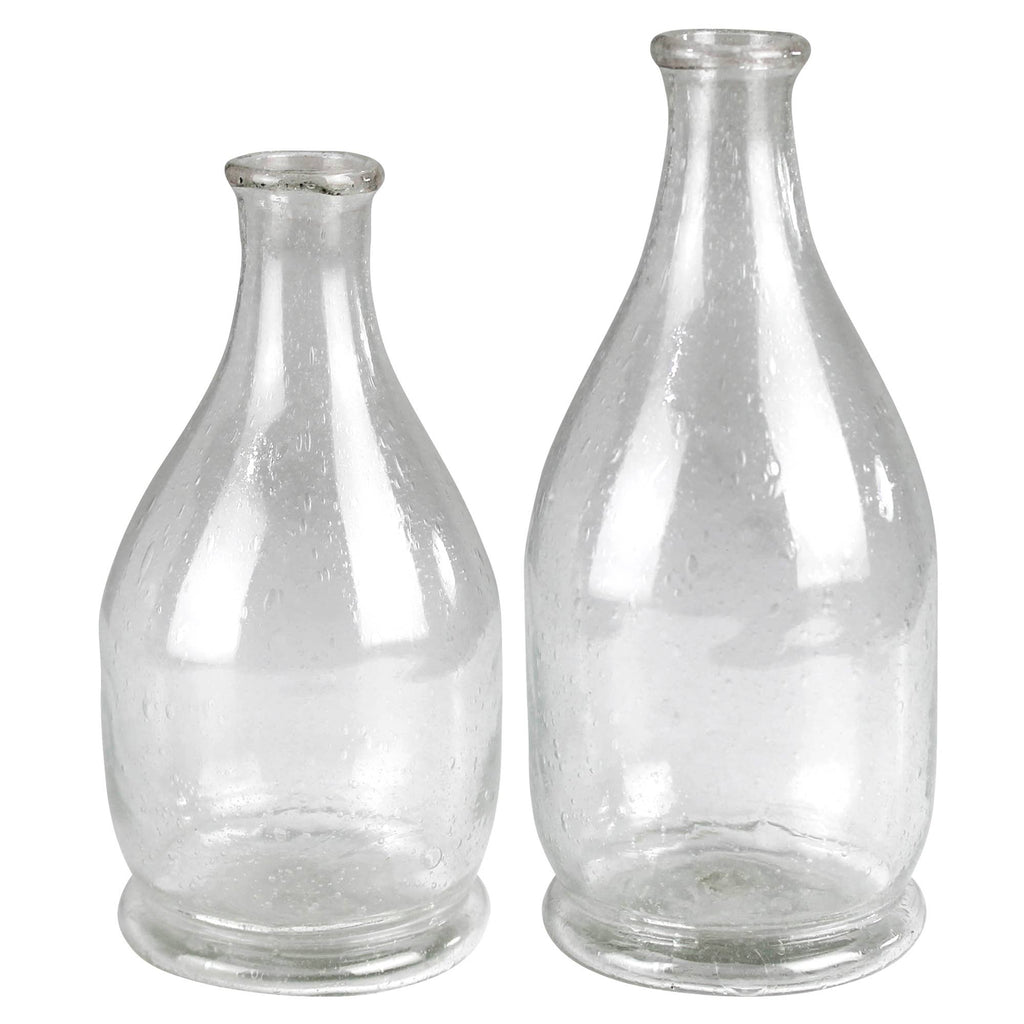 The Peppered Glass Bottles, Set of 2 by HomArt feature wide bases, narrow necks, and unique textured details with bubbles—ideal as recycled glass decor or distinctive accents for any space.