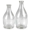 The Peppered Glass Bottles, Set of 2 by HomArt feature wide bases, narrow necks, and unique textured details with bubbles—ideal as recycled glass decor or distinctive accents for any space.
