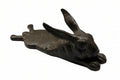 The Koppers Home Cast Iron Bunny Door Stop, dark brown stretching out with upright ears—an adorable decorative accent for any door.