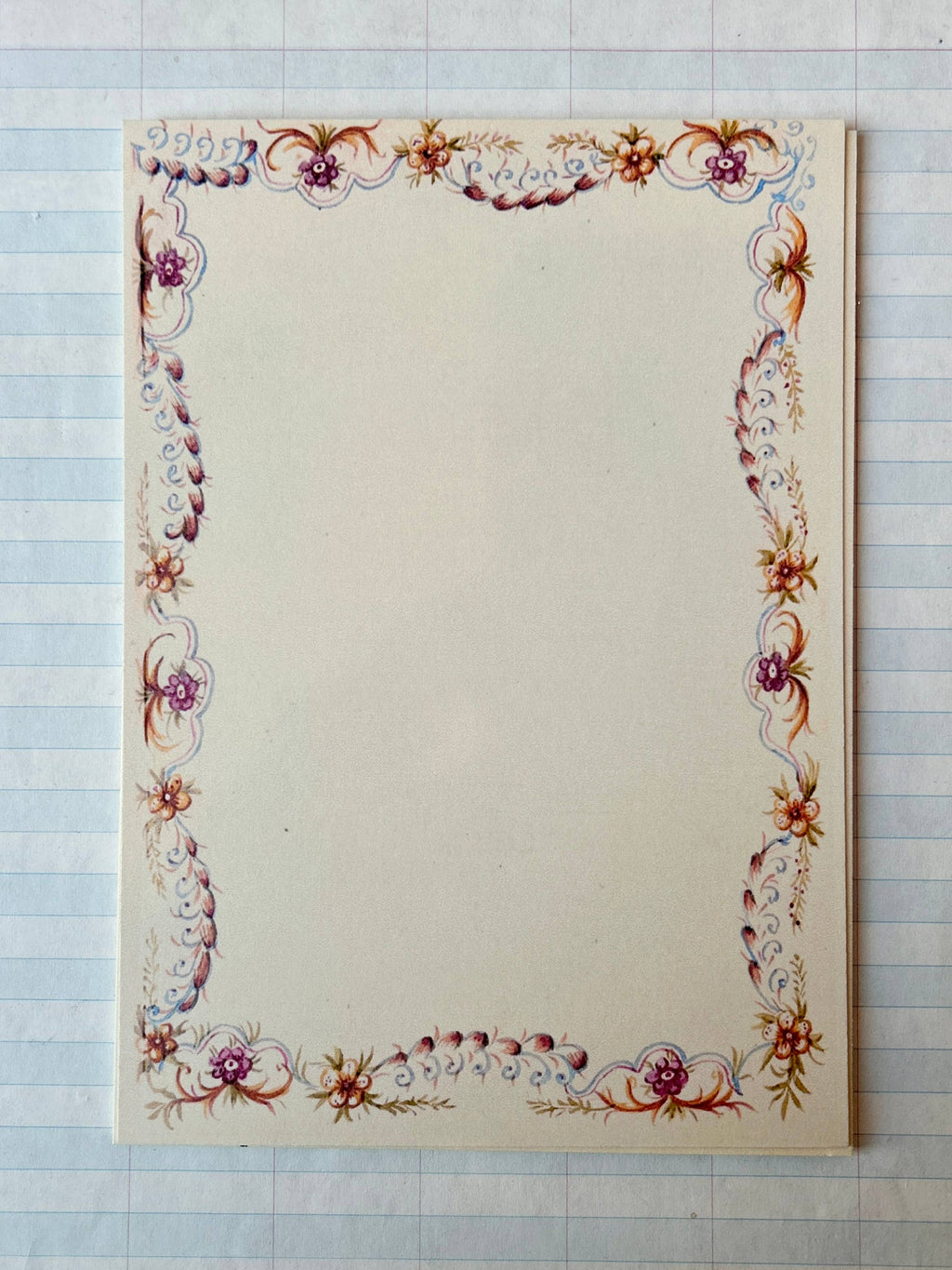 The Parcel French Menu Stationery Set II: 2 features creamy white cardstock cards with ornate red, purple, and gold floral borders—ideal for special occasions as single printed cards or in a set of 8.