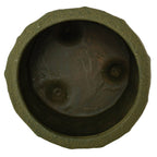 Top-down view of the Foreside Home & Garden Matte Green Ceramic Pot Small, featuring a greenish-brown, textured finish, an uneven rim, and three distinct dents on the bottom surface.