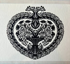 Papercut Heart Art Cards by Parcel feature an intricate black symmetrical tree with detailed leaves and branches inside a heart-shaped border on textured white. Comes as a 5x7 card with a creamy white envelope.