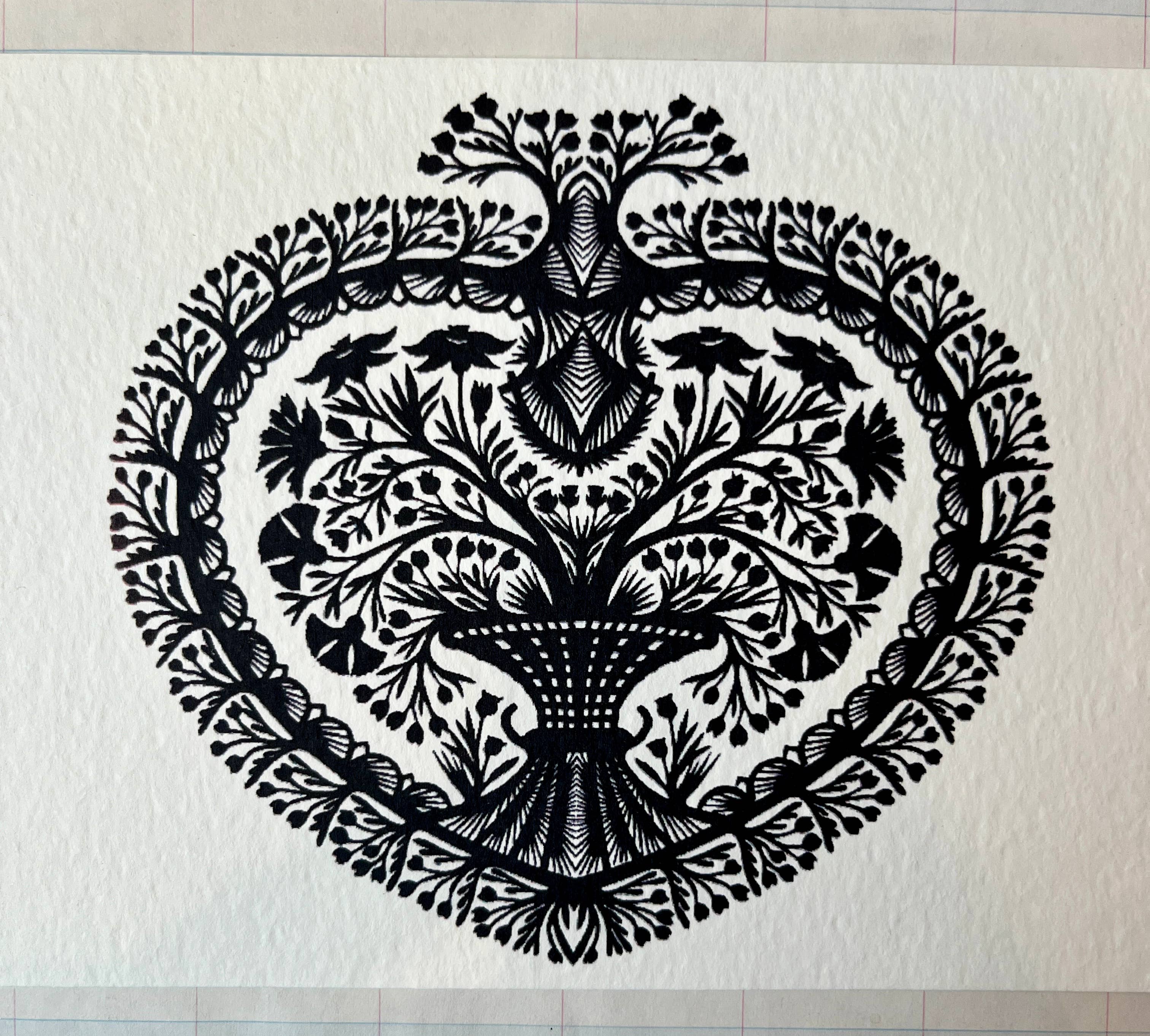 Papercut Heart Art Cards by Parcel feature an intricate black symmetrical tree with detailed leaves and branches inside a heart-shaped border on textured white. Comes as a 5x7 card with a creamy white envelope.