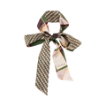 The Silk Skinny Scarf - Green by Lost Pattern NYC features a geometric pattern in green, brown, cream, and yellow. Made of silk satin with double-sided stitching and LOST PATTERN branding—ideal as a chic hair accessory tied in a bow.