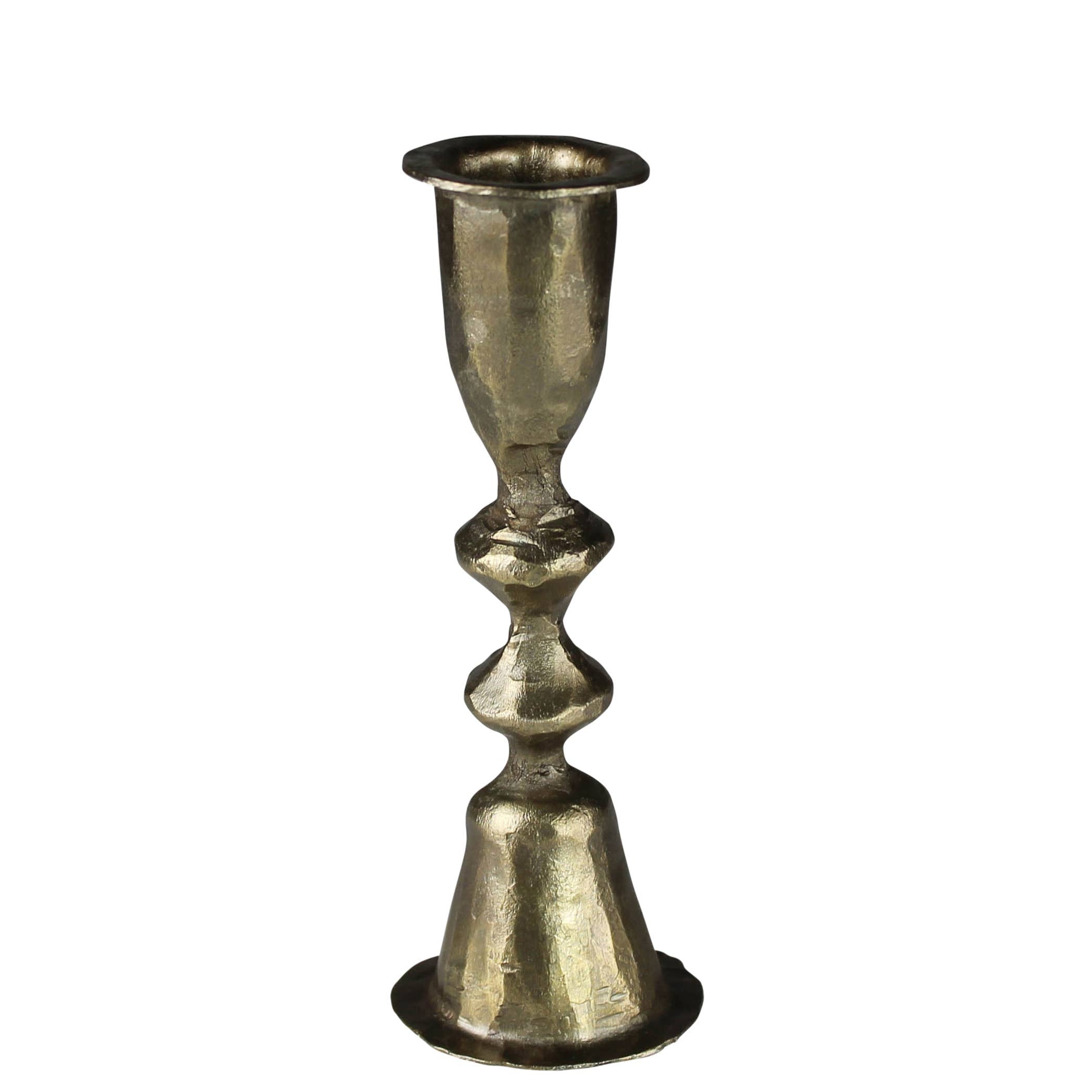 The HomArt Haiku Taper Holder, Brass - Med, features a textured surface, flared base, and elegant bulbous stem—a Thai-inspired piece perfect for adding refined candlelight to any setting.
