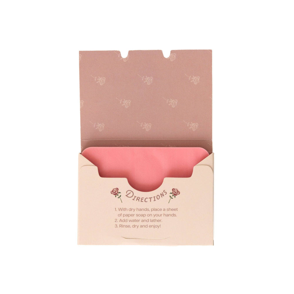 An open 123 Farm Paper Soap – Rose Scent, Travel Size (50 Sheets) box reveals pink handwashing sheets. Floral packaging provides eco-friendly use instructions: remove sheet with dry hands, add water, lather, then rinse.
