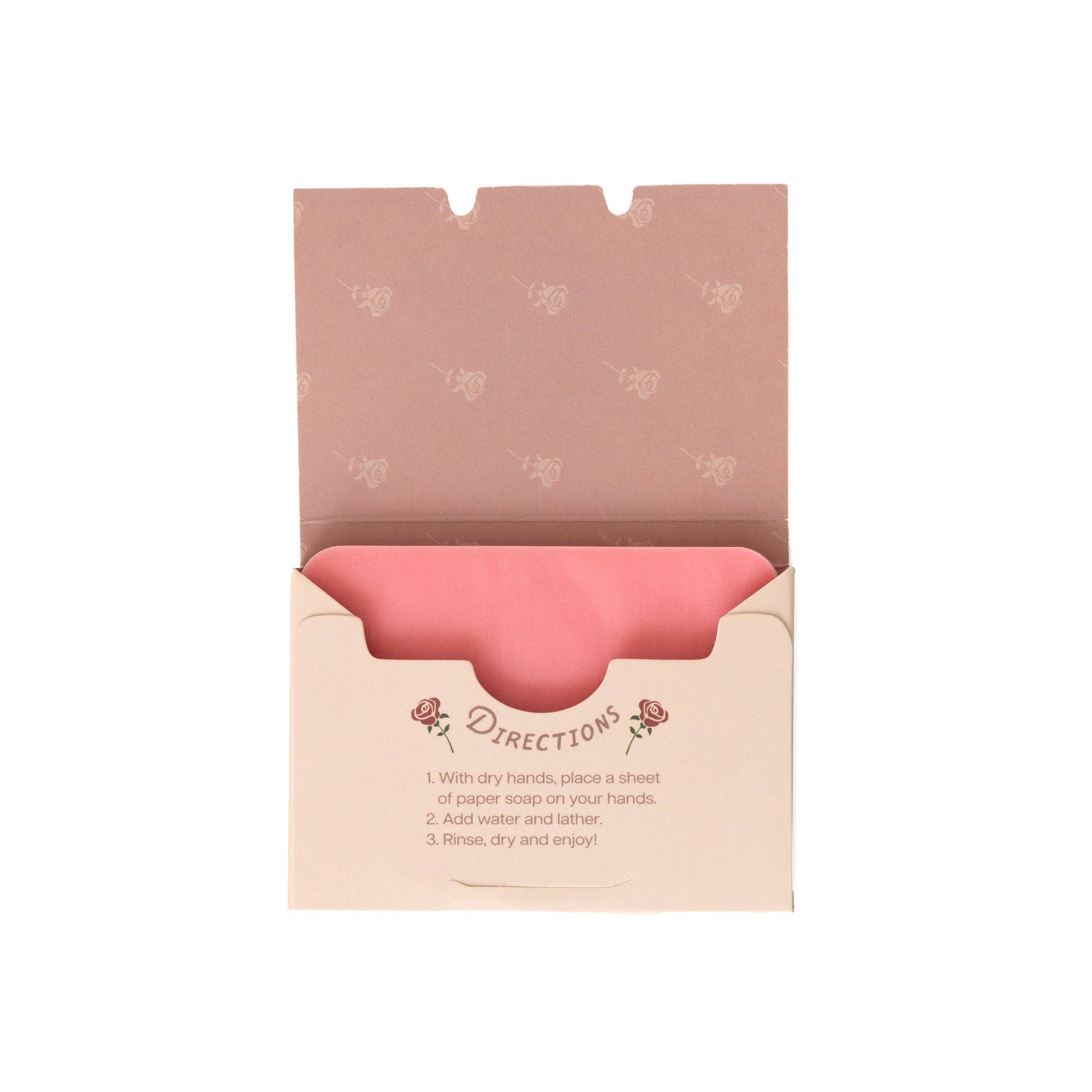 An open 123 Farm Paper Soap – Rose Scent, Travel Size (50 Sheets) box reveals pink handwashing sheets. Floral packaging provides eco-friendly use instructions: remove sheet with dry hands, add water, lather, then rinse.