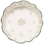 The Danica Heirloom Camellia Bowl Large 8 inch features a scalloped edge, green rim, and red and green floral pattern on white—perfect for a rustic farmhouse bowl look.