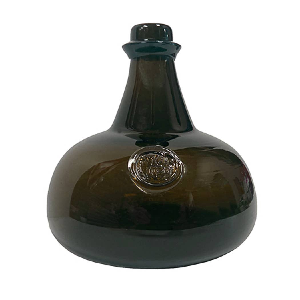 The Madison Bay Co. Hand-Blown Dark Green 76-oz. Onion Bottle (8") features a wide base, narrow neck, short top, and an embossed front medallion. This historical reproduction is shown on a plain white background.