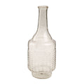 The Indaba Trading Recycled Glass Bottle Vase, Clear, features a long narrow neck, rounded body with a textured dimpled pattern, and flat base. This vintage-inspired vase is empty and displayed against a plain white background.