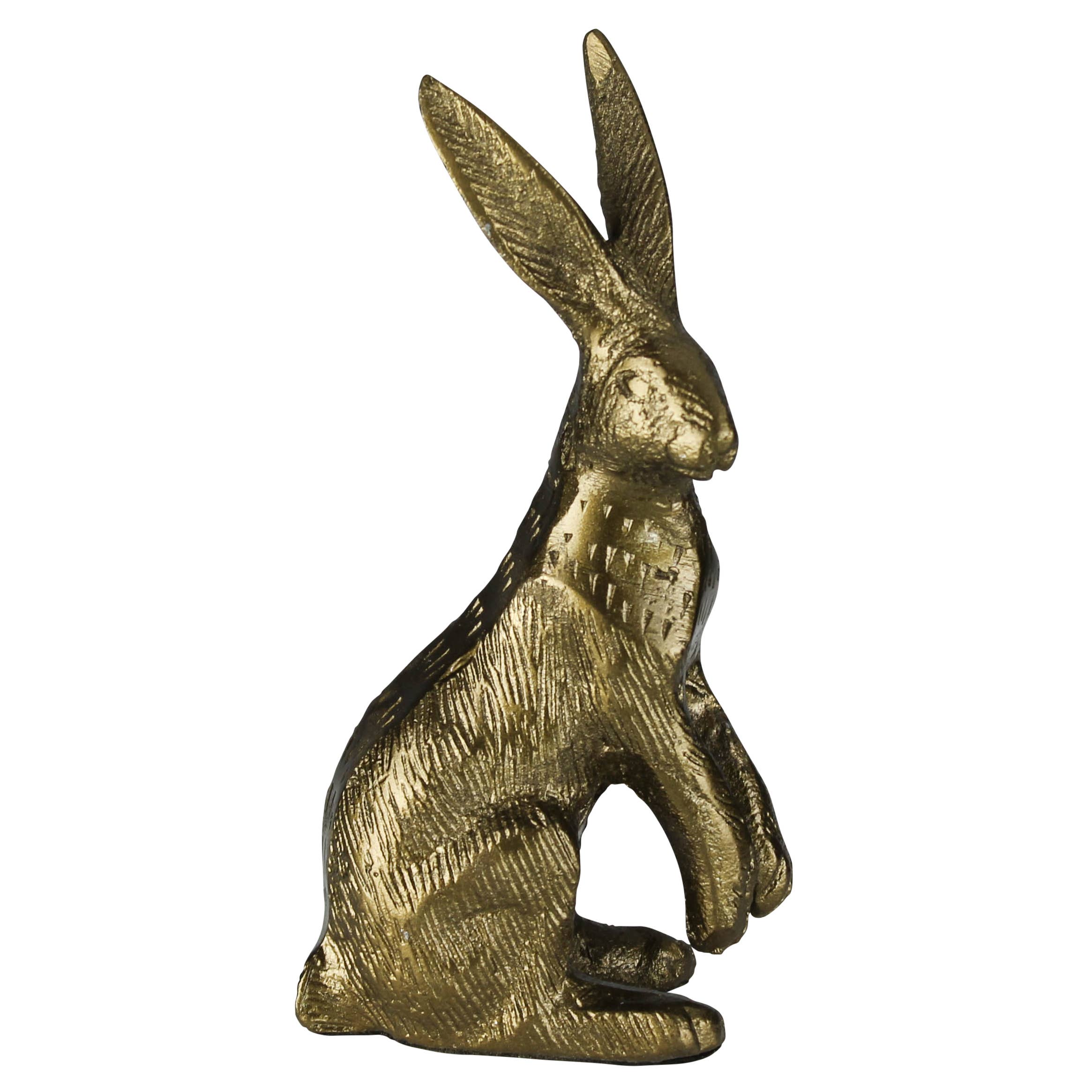 The HomArt Hare, Brass is a small, gold-finished brass sculpture featuring a hare sitting upright with long ears and textured fur, making it a charming desk or shelf accent.