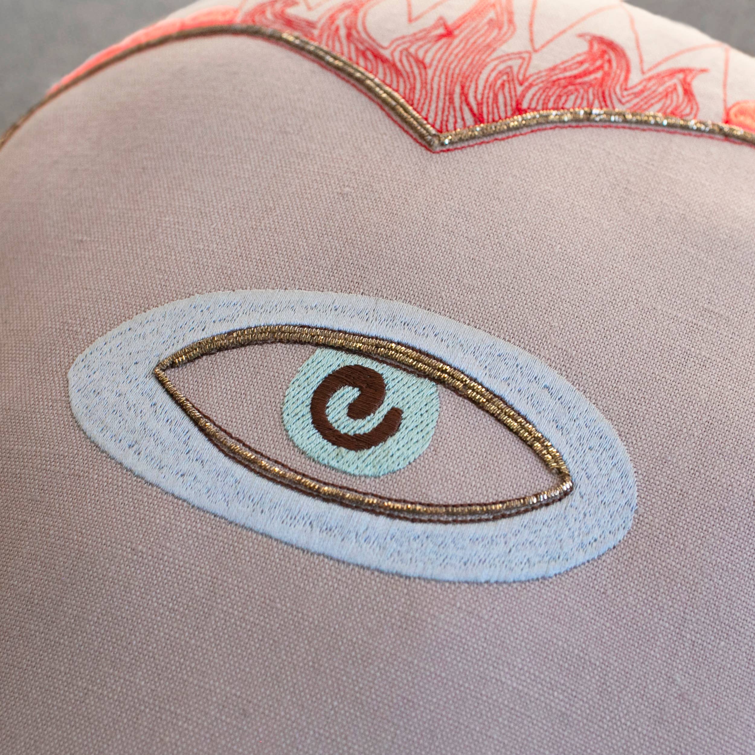 The Skippy Cotton Sacred Heart Pillow is a handmade, cotton-filled cushion that makes a whimsical addition to any space.