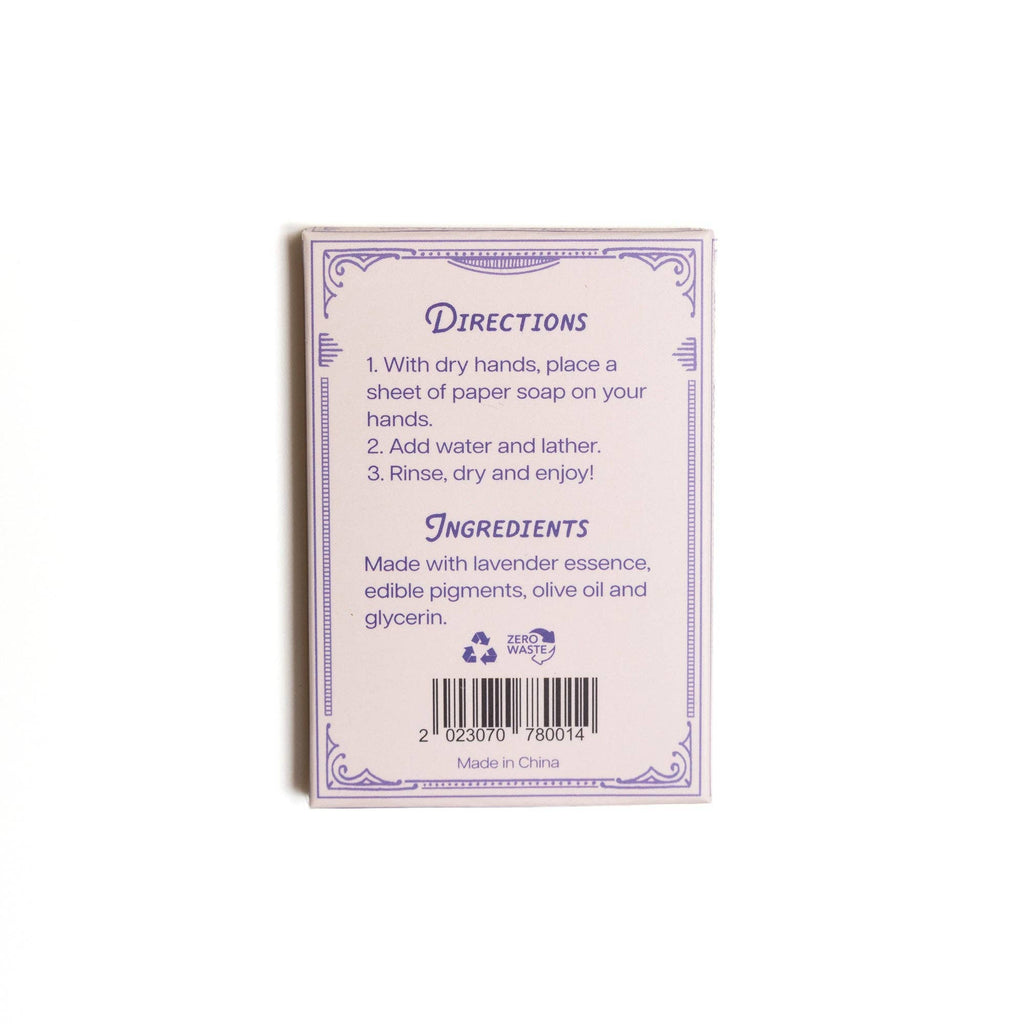 The back of the 123 Farm Paper Soap – Lavender Scent, Travel Size, 50 Sheets shows purple text with directions to use dry hands and add water to a sheet. Ingredients include lavender essence, edible pigments, olive oil, and glycerin.
