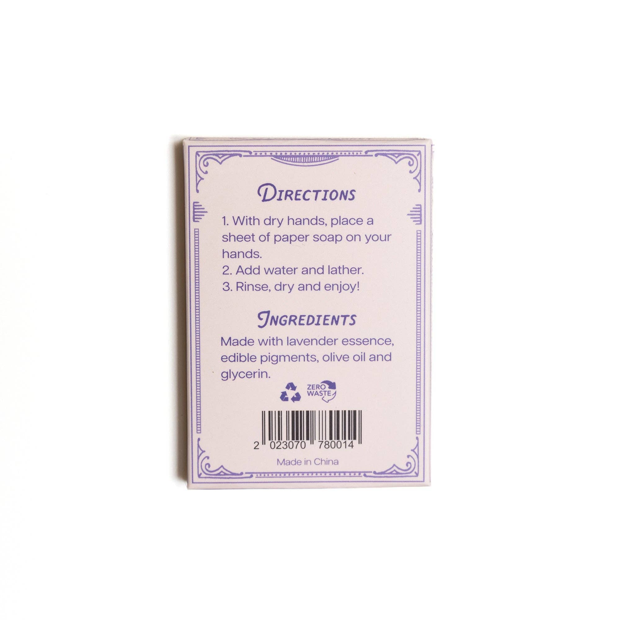 The back of the 123 Farm Paper Soap – Lavender Scent, Travel Size, 50 Sheets shows purple text with directions to use dry hands and add water to a sheet. Ingredients include lavender essence, edible pigments, olive oil, and glycerin.
