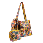 The Calico Quilted Tote set by Handker Bandanas features a quilted tote, drawstring bag, and zippered pouch in colorful bandana cotton patchwork, all displayed on a white background.