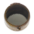 The HomArt Josephine Mirrored Box, Brass - Sm Round, features intricate side engravings, a hinged glass lid, and an inner rim with evenly spaced teeth-like details.