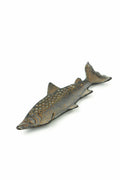 The Vagabond Vintage Cast Iron Fish Dish features a textured finish with small raised dots along its body, shown against a plain white background.
