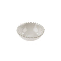 The Scalloped Bowl XS by Indaba Trading is a small, round, handcrafted white stoneware bowl with a glossy finish and delicate scalloped edge, shown on a plain white background.