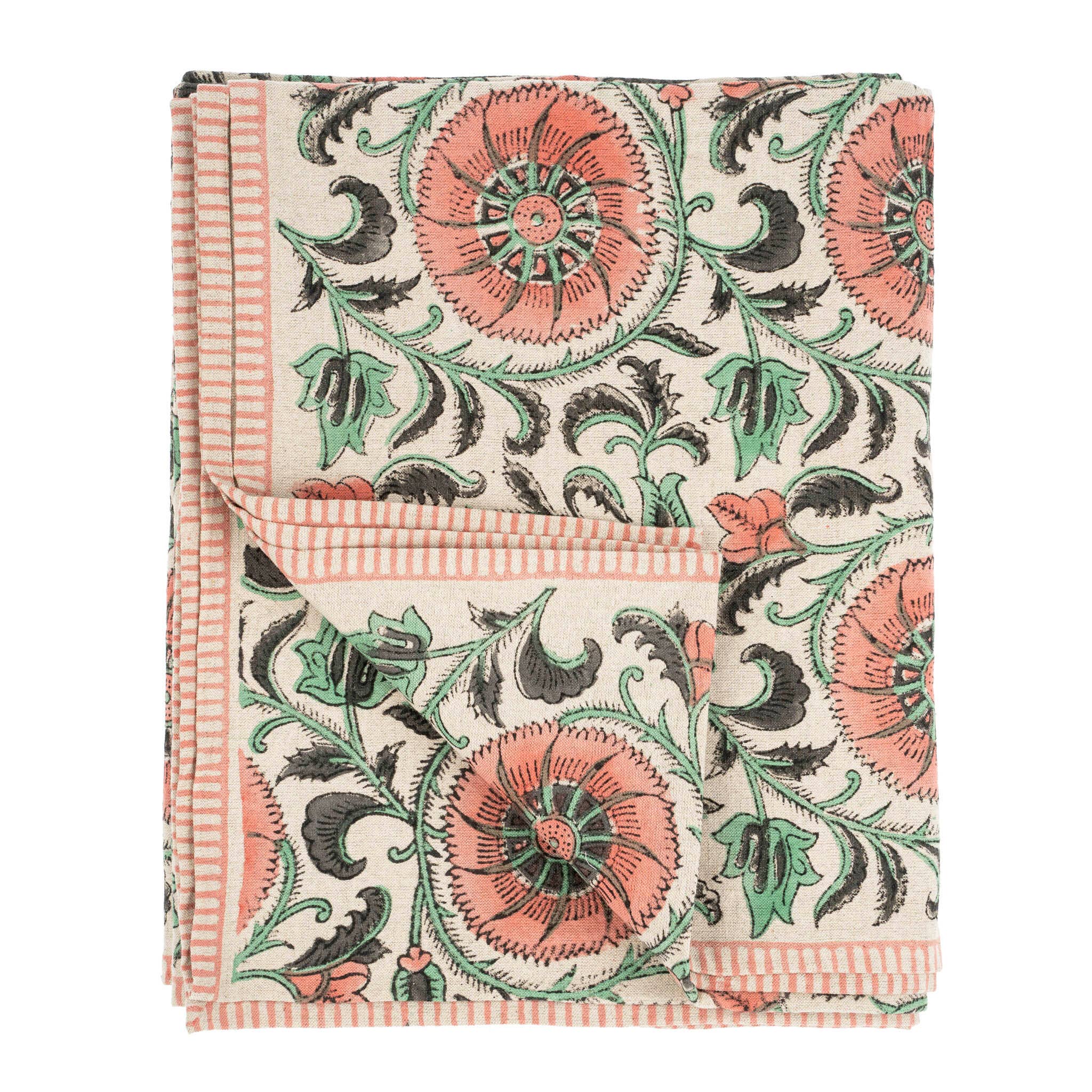 The Botanique Block Print Tablecloth Pink by Indaba Trading is crafted from a linen-cotton blend with a hand block floral print in coral, green, and black on cream, finished with thin coral striped borders and a turned-up corner to show the reverse.