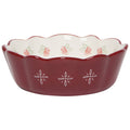 The Danica Heirloom Camellia Bowl Medium 5.75 inch features a red scalloped edge, white floral exterior, and red-green flower designs inside—perfect for adding rustic farmhouse charm.