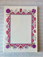 The Parcel Colorful Folk Frame features a blank white cardstock card with a hand-drawn floral border in pink, red, and purple shades framing an empty center. Set of 8.