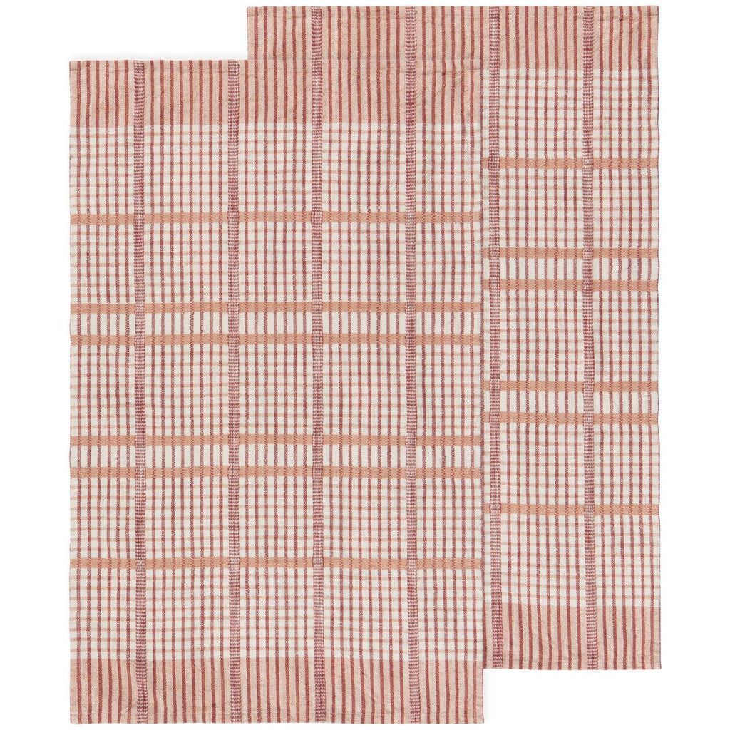 Rectangular rug with pink and white grid lines, inspired by Danica Heirloom’s Bisque Finley Check Dishtowels Set of 2. Features an L-shaped cut-out in one corner that disrupts the classic checked pattern.