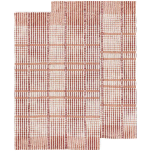Rectangular rug with pink and white grid lines, inspired by Danica Heirloom’s Bisque Finley Check Dishtowels Set of 2. Features an L-shaped cut-out in one corner that disrupts the classic checked pattern.