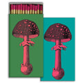 HomArt’s Match - Tall Mushrooms features a detailed pink and black mushroom design on green, with a matching card on teal—ideal as stylish decor or a unique gift.