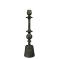The HomArt Bastia Taper Holder, Green Patina - Med features a tall, dark, antique-style design with geometric accents and a textured finish—ideal for bringing vintage charm to your decor.