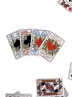 Five ornate G. Quenioux Playing Cards - 1900 Paris Exposition Facsimile by Vieux Monde—spade, club, diamond, heart, and another diamond—are fanned out on white, with other cards peeking around the edges.