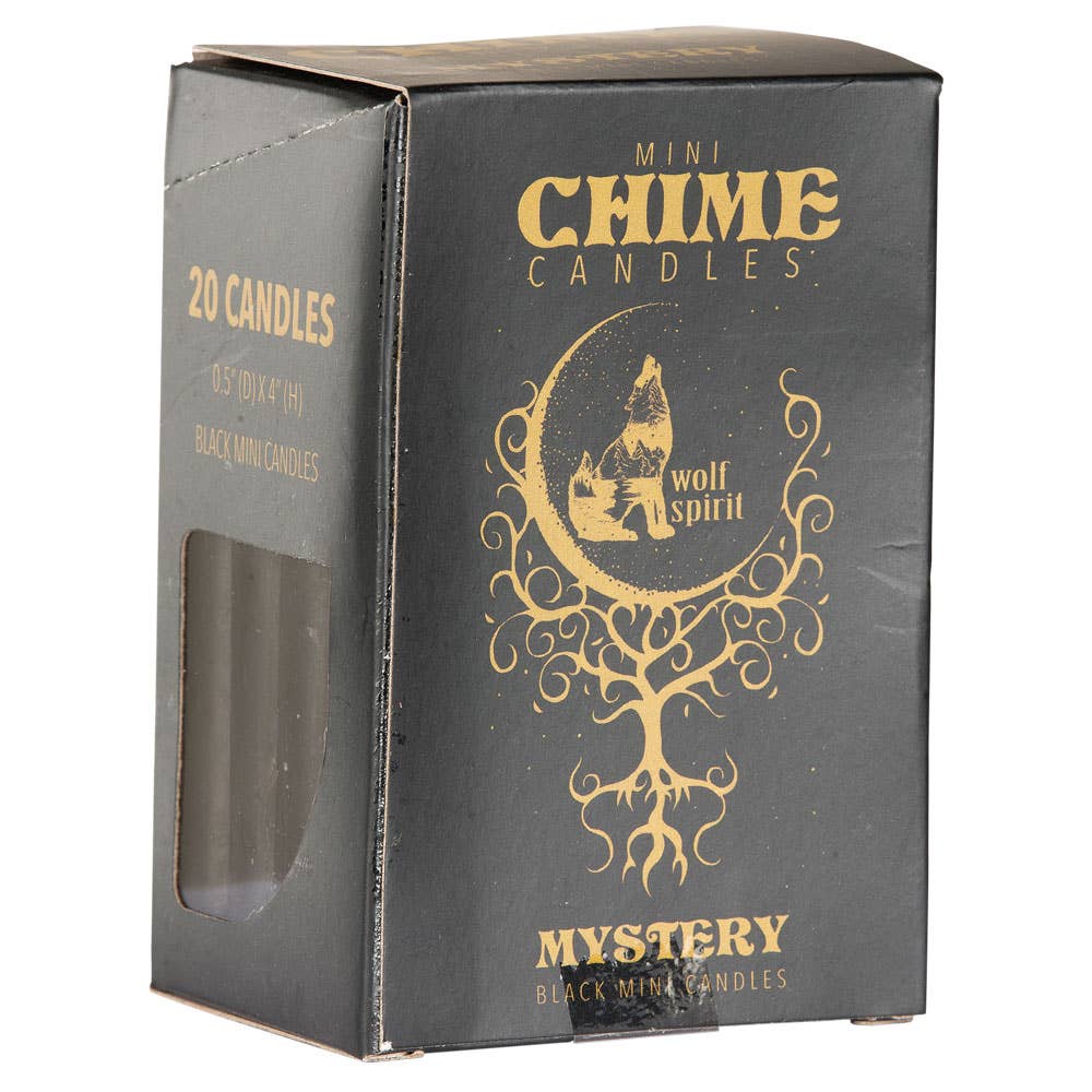 A black box of SPIRIT LIGHT CANDLES: MYSTERY | BLACK by Benjamin International features gold designs, a wolf howling at the moon, a stylized tree, and text reading “Wolf Spirit” and “20 Reiki-charged meditation candles.”.