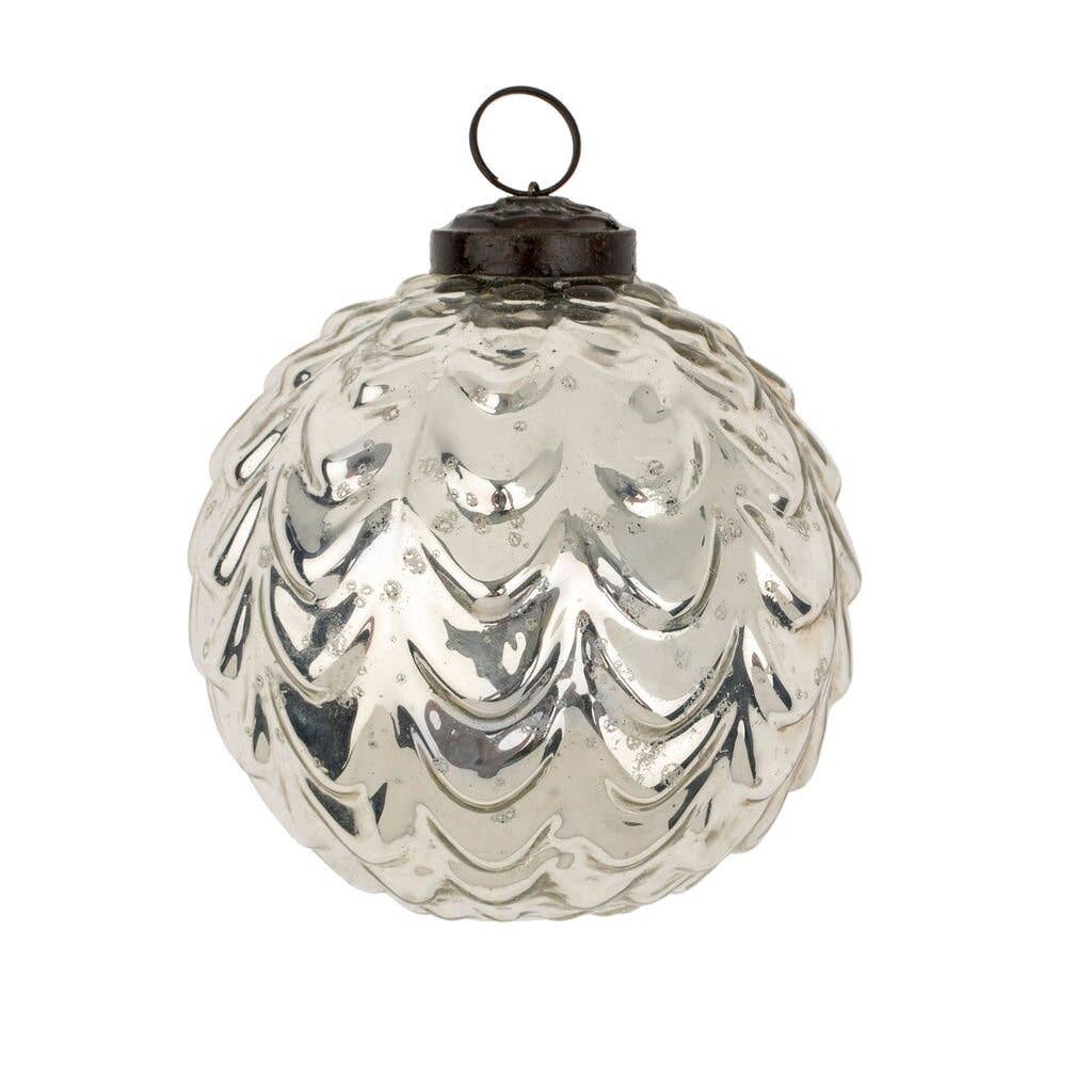The Silverfrost Bauble by Indaba Trading is a round, silver Christmas ornament with a textured, wave-like ribbed finish and a metal cap with hanging loop.