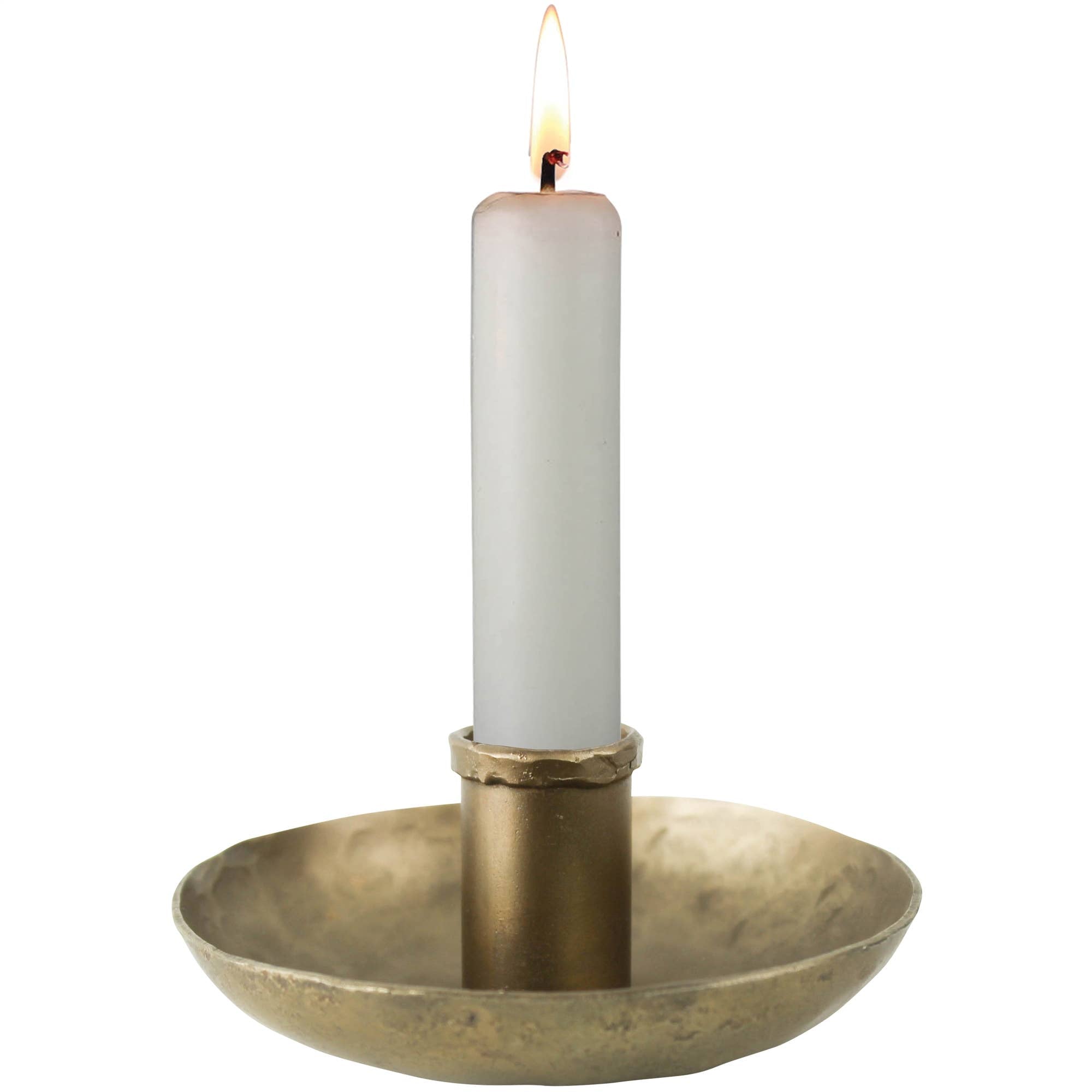 A lit white candle stands in the HomArt Tanta Taper Holder, crafted from brass-plated aluminum, featuring a simple round base against a plain white background.