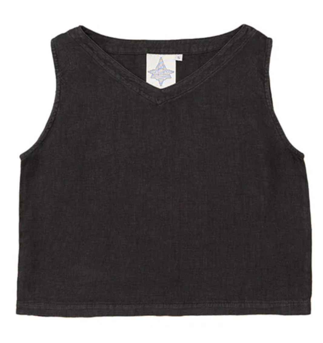 Sleeveless black V-neck Basic Cami Tank from Thyne Goods laid flat, visible stitching, and a small tag with a star logo near the neckline.