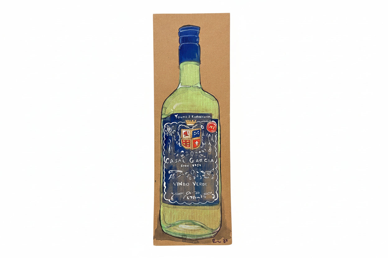 A hand-drawn Rachel Nelson • Young + Refreshing wine bottle by Thyne Goods is featured on brown cardboard—green glass with a blue cap, blue and white label, and light yellow liquid—a true Rachel Nelson art piece.